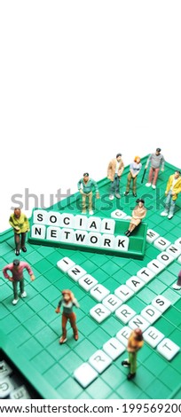 Social network and miniature people on word game board