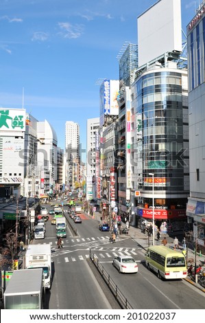 TOKYO, JAPAN - DECEMBER 28, 2011: Typical view of busy street in central Tokyo