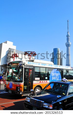 TOKYO, JAPAN - DECEMBER 31, 2011: Shuttle bus service links Tokyo\'s newest tourist attraction, including the Sky Tree - tallest structure in Japan and the second tallest structure in the world