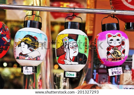 TOKYO, JAPAN - DECEMBER 30, 2011: Colorful traditional lanterns displayed in the market of Asakusa district
