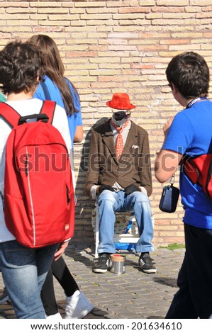 ROME, ITALY - MARCH 28, 2012: Invisible man street performer in Prati district, Rome
