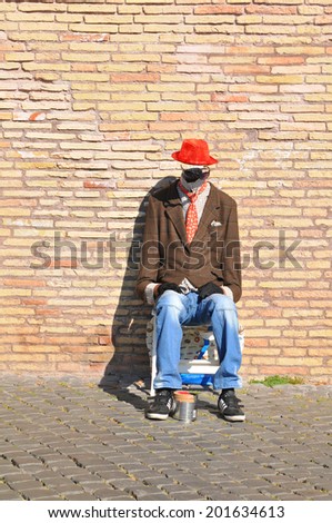 ROME, ITALY - MARCH 28, 2012: Invisible man street performer in Prati district, Rome