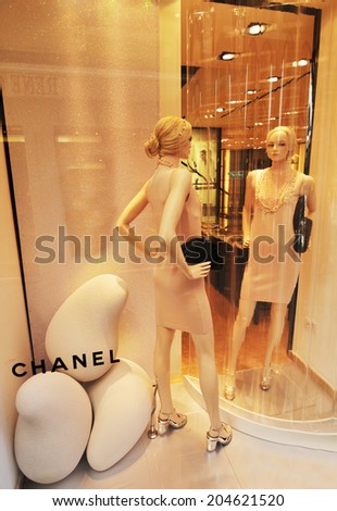 VENICE, ITALY - MAY 7, 2012: Mannequins advertising new fashion collection in Chanel store on commercial street in Venice