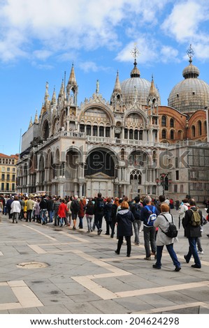 VENICE, ITALY - MAY 6, 2012: Tourists visiting the San Marco Basilica in Piazza di San Marco