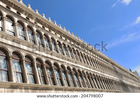 VENICE, ITALY - MAY 6, 2012: Architectural detail of the Procuratie Vecchie arcade building in San Marco square, Venice (Italy)
