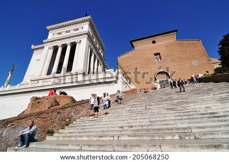 ROME, ITALY - MARCH 30, 2012: Tourists visit the Vittorio Emanuele II monument in Piazza Venezia, Rome