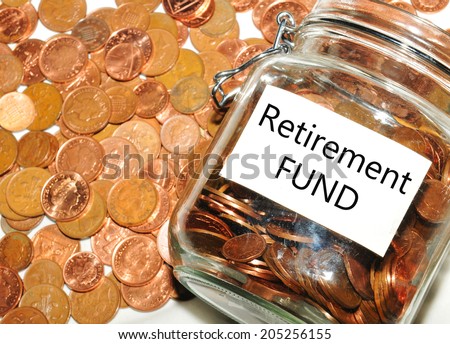 Retirement fund concept with jar of money and coins