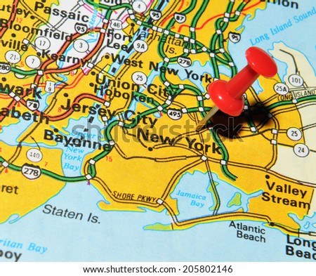 New York city marked with red pushpin on US map. New York is the most populous city in the world