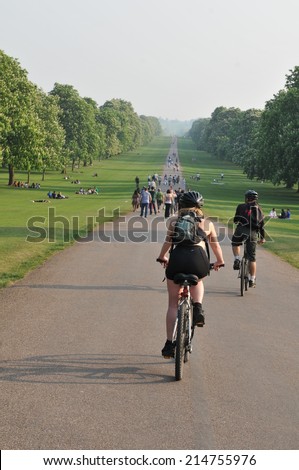 WINDSOR, UK - APRIL 24, 2011: People enjoy their time outdoors in Windsor Great Park