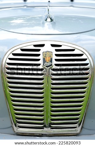 NOTTINGHAM, UK - JUNE 1, 2014: Frontal detail of Austin vintage car logo and radiator.
