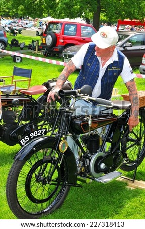 NOTTINGHAM, UK - JUNE 1, 2014: Owner presents vintage motorbike for sale in Nottingham, England.