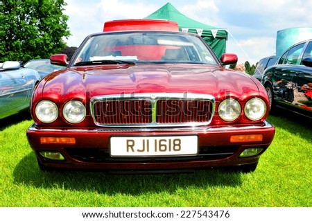 NOTTINGHAM, UK - JUNE 1, 2014: Frontal detail of a vintage Jaguar car for sale in Nottingham, England.