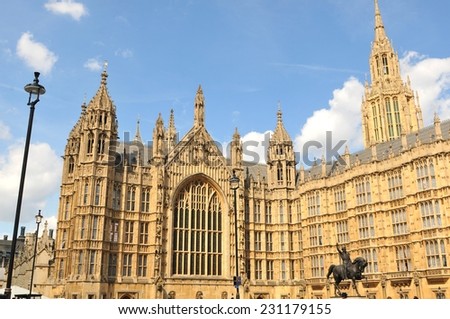Architectural detail of the British Parliament building against blue sky
