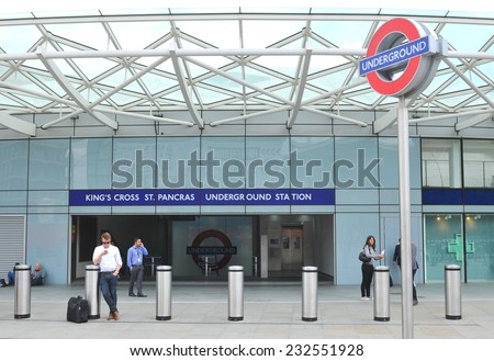 LONDON, UK - JULY 9, 2014: People wait outside the King\'s Cross underground station in London.