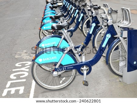 LONDON, UK - JULY 9, 2014: Barclays bikes parked in central London