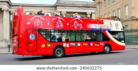 LONDON, UK - JULY 9, 2014: Traditional red double-decker tour bus is waiting for tourists in central London.