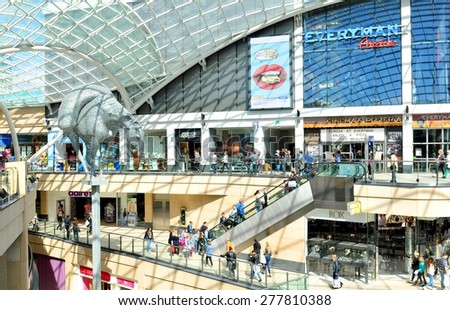 LEEDS, UK - APRIL 17, 2015: People shop in Trinity central mall in Leeds, England, major commercial area of the city.