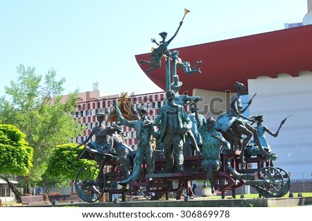 BUCHAREST, ROMANIA - JUNE 24, 2015. Architectural detail of the Carriage with Clowns sculpture by Ioan Bolborea in front of the Ion Luca Caragiale National Theatre