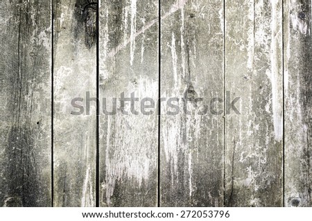 Old board. Old cracked board long lain outdoors. Background of wood.