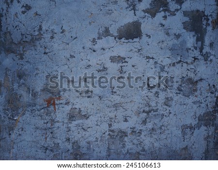 blue concrete wall with cracks