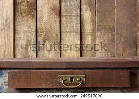 Wooden table  against a wall from boards
