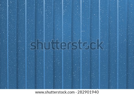 Leaf of a blue professional flooring with water drops