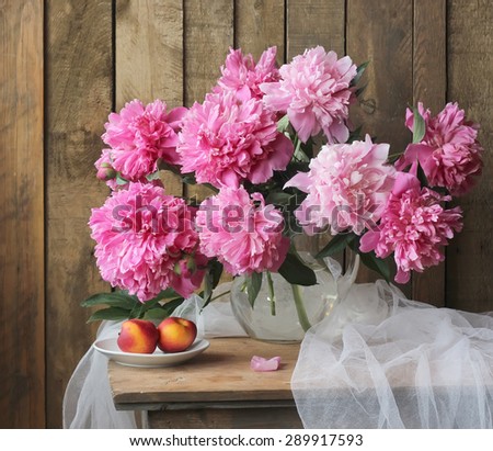 Still life with a bouquet of peonies