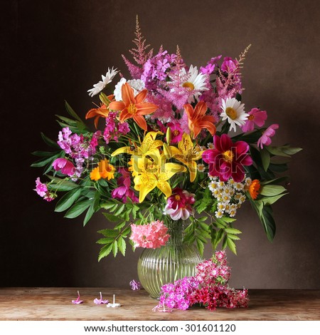 Bouquet from cultivated flowers in a jug