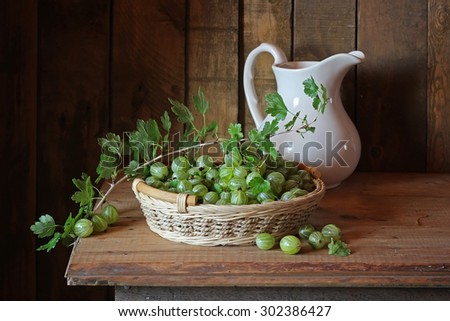 Still life with a gooseberry and a jug
