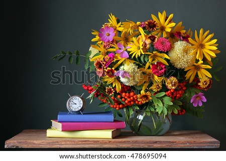 Bouquet and book. Back to school. September 1, knowledge Day. The teacher\'s day.