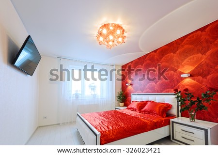 Comfortable and cozy white and red bedroom