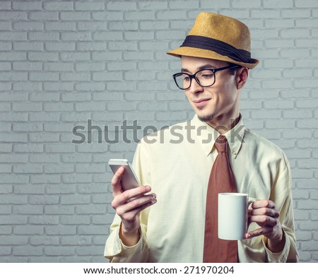 Young man looking at mobile phone