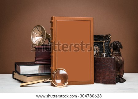 Composition of book and decor in vintage style