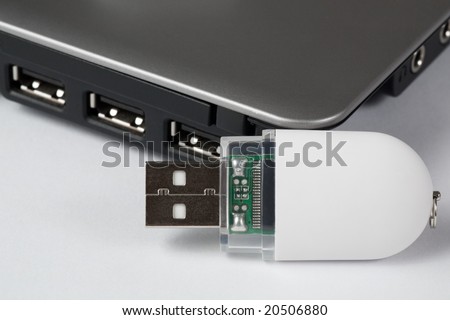 White pen drive and USB ports