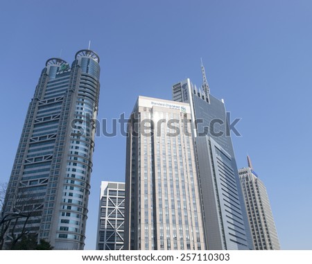 SHANGHAI-FEB. 9, 2015. Skyscrapers at Lujiazui, a national-level development zone designated by government. In 2005, State Council reaffirmed positioning of Lujiazui area as finance and trade zone.