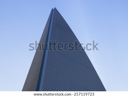 SHANGHAI-FEB. 9, 2015: World Financial Center against blue sky. SWFC opened on 28 August 2008. The second tall and landmark of Shanghai China. Nearby Jinmao tower.
