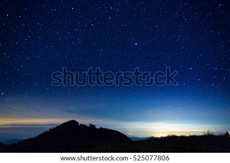night sky with star on top of mountain