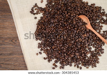preparation for a coffee menu is made from coffee beans, line and burlap