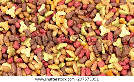 Dry pet food (dog or cat) multicolored background.