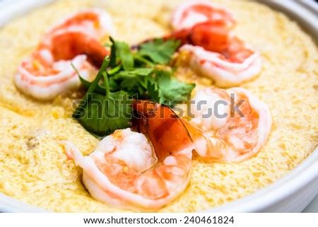 Dish of steamed egg with big shrimp