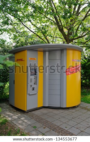 MUNICH - MAY 31: DHL Packstation in Munich on May 31, 2012. These stations are system developed by DHL for Deutsche Post who won the German Industry Innovation Award for its Generations Pact