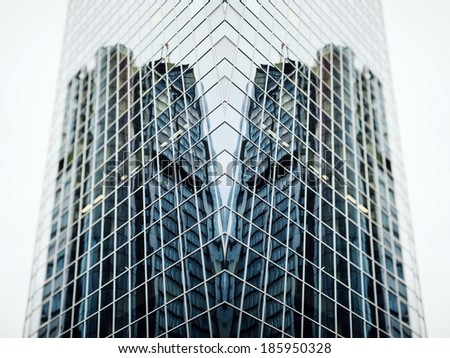 Futuristic building with overlayed perspective wide angle view of a glass high rise building skyscrapers in modern futuristic downtown