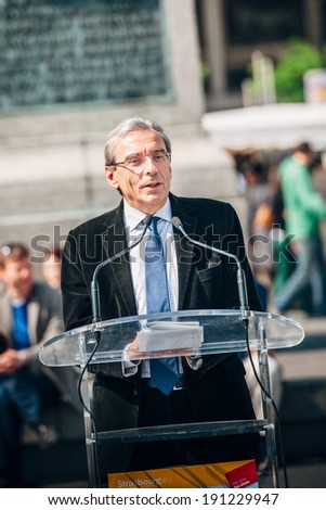STRASBOURG, FRANCE - APRIL 14, 2014: Roland Ries mayor of Strasbourg addressing the citizens in Place Kleber, Strasbourg, France. Mr Reis ( socialist party) was re elected mayor on March 30, 2014