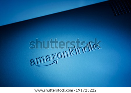 CUPERTINO, UNITED STATES - FEBRUARY 11, 2012: Studio shot of Kindle Reader logo from Amazon.com back side On February 11, 2012. Amazon Kindle devices enable users to shop and read ebooks