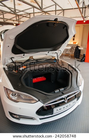 PARIS, FRANCE - NOVEMBER 29, 2014: Open front trunk of a Tesla car at showroom in Paris, France. Tesla is an American company that designs, manufactures, and sells electric cars