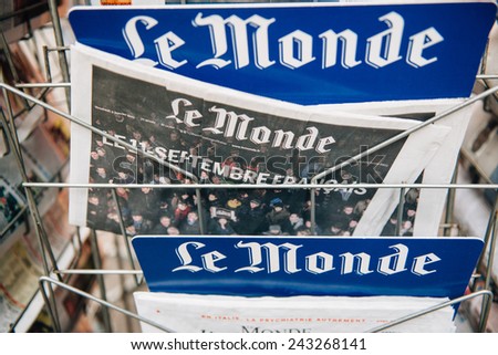 STRASBOURG, FRANCE - 10 JAN, 2015: The front covers of International newspapers display of Le Monde Magazine  headlining the terrorist attacks yesterday in Paris on January 8, 2015