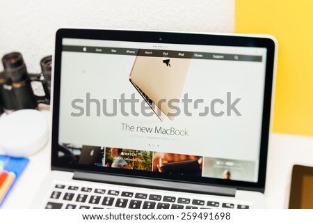 PARIS, FRANCE - MAR 10, 2015: Apple Computers website on MacBook Retina in room environment showcasing the New MacBook as seen on 10 March, 2015 with tilt-shift lens