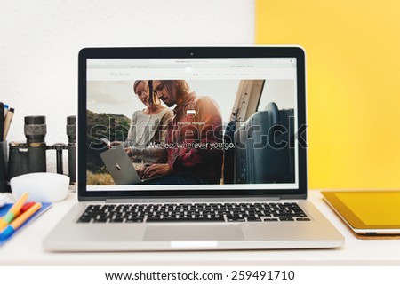 PARIS, FRANCE - MAR 10, 2015: Apple Computers website on MacBook Retina in room environment showcasing new MacBook Personal Hotspot as seen on 10 March, 2015