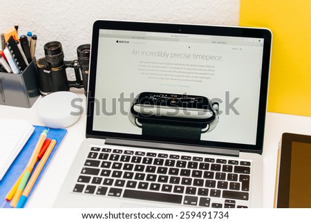 PARIS, FRANCE - MAR 10, 2015: Apple Computers website on MacBook Retina in room environment showcasing Apple Watch as a incredibly precise timepiece as seen on 10 March, 2015
