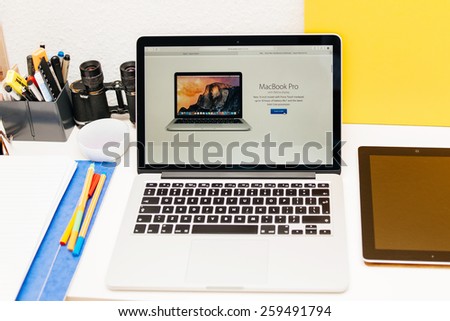 PARIS, FRANCE - MAR 10, 2015: Apple Computers website on MacBook Retina in room environment showcasing  the MacBook Pro Retina update specks as seen on 10 March, 2015